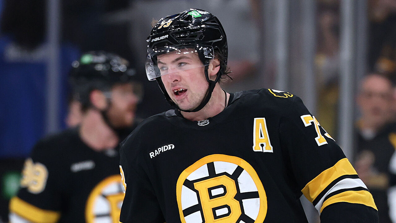 BOSTON, MASSACHUSETTS - MARCH 10: Charlie McAvoy #73 of the Boston Bruins looks on, with blood in his mouth, after the Bruins defeat the Los Angeles Kings 2-1 in overtime at TD Garden on March 10, 2026 in Boston, Massachusetts.