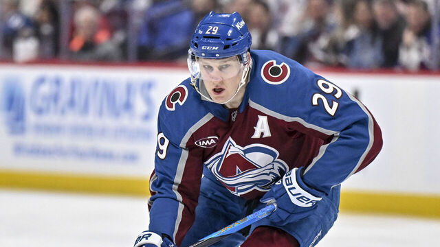 DENVER , CO - MARCH 10: Nathan MacKinnon (29) of the Colorado Avalanche handles the puck during the first period against the Edmonton Oilers at Ball Arena on Tuesday, March 10, 2026.