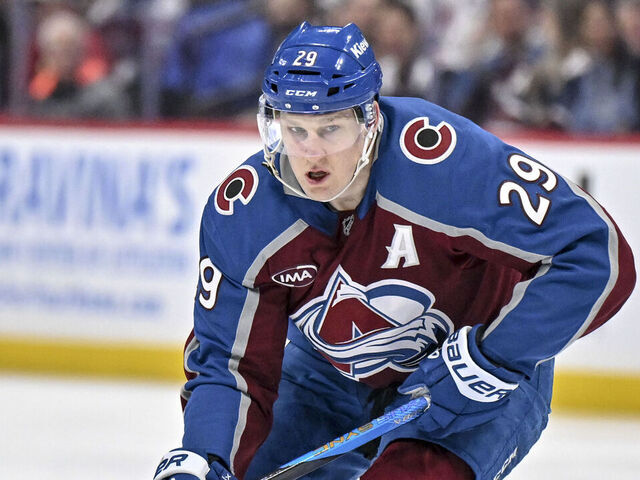 DENVER , CO - MARCH 10: Nathan MacKinnon (29) of the Colorado Avalanche handles the puck during the first period against the Edmonton Oilers at Ball Arena on Tuesday, March 10, 2026.