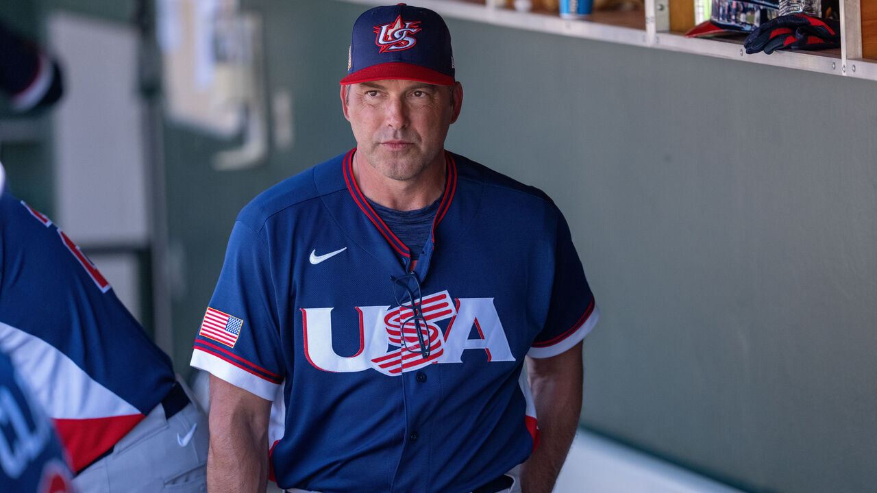 SCOTTSDALE, AZ - MARCH 03: Manager Mark DeRosa #9 of Team USA looks on from the dugout during the 2026 World Baseball Classic exhibition game presented by Capital One between Team USA and San Francisco Giants at Scottsdale Stadium on Tuesday, March 3, 2026 in Scottsdale, Arizona.