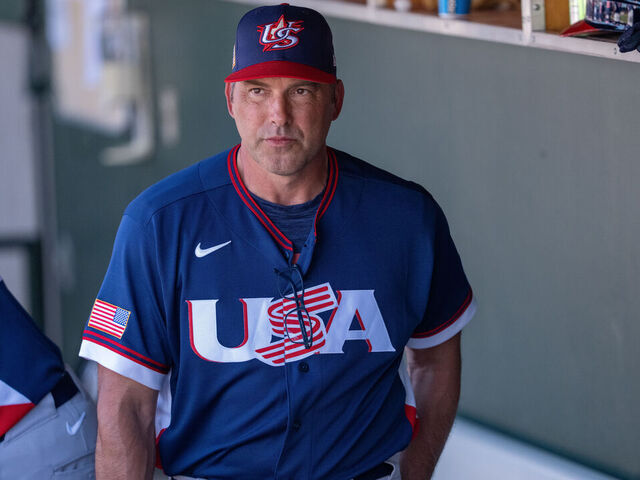 SCOTTSDALE, AZ - MARCH 03: Manager Mark DeRosa #9 of Team USA looks on from the dugout during the 2026 World Baseball Classic exhibition game presented by Capital One between Team USA and San Francisco Giants at Scottsdale Stadium on Tuesday, March 3, 2026 in Scottsdale, Arizona.