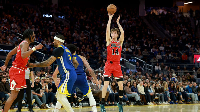SAN FRANCISCO, CALIFORNIA - MARCH 10: Matas Buzelis #14 of the Chicago Bulls shoots over Gui Santos #15 of the Golden State Warriors at Chase Center on March 10, 2026 in San Francisco, California. NOTE TO USER: User expressly acknowledges and agrees that, by downloading and/or using this photograph, user is consenting to the terms and conditions of the Getty Images License Agreement.
