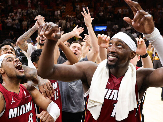 MIAMI, FLORIDA - MARCH 10: Bam Adebayo #13 of the Miami Heat celebrates with teammates after a 150-129 win against the Washington Wizards at Kaseya Center on March 10, 2026 in Miami, Florida. Adebayo passed Kobe Bryant for the second most points scored in an NBA game with 83.