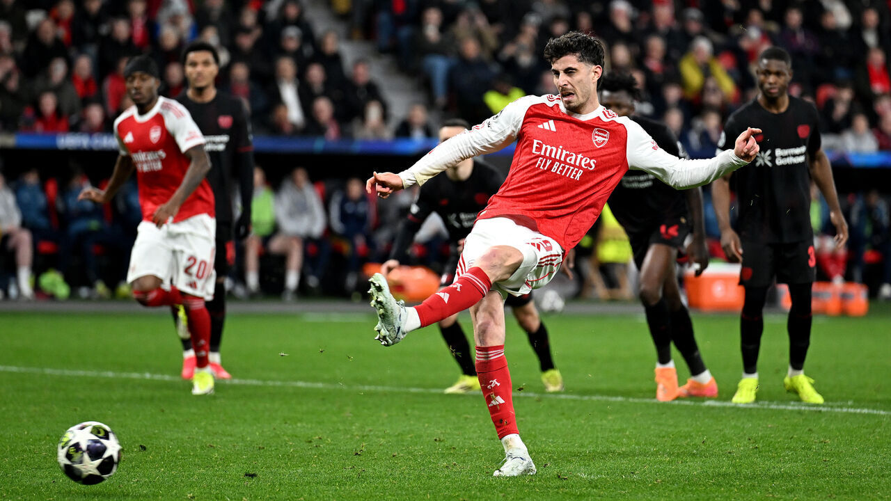 LEVERKUSEN, GERMANY - MARCH 11: Kai Havertz of Arsenal scores his team's first goal from the penalty spot during the UEFA Champions League 2025/26 Round of 16 First Leg match between Bayer 04 Leverkusen and Arsenal FC at BayArena on March 11, 2026 in Leverkusen, Germany.