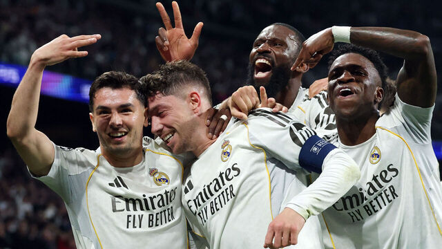Real Madrid's Uruguayan midfielder #08 Federico Valverde (2L) celebrates his third goal during the UEFA Champions League last 16 first leg football match between Real Madrid CF and Manchester City at Santiago Bernabeu Stadium in Madrid on March 11, 2026.