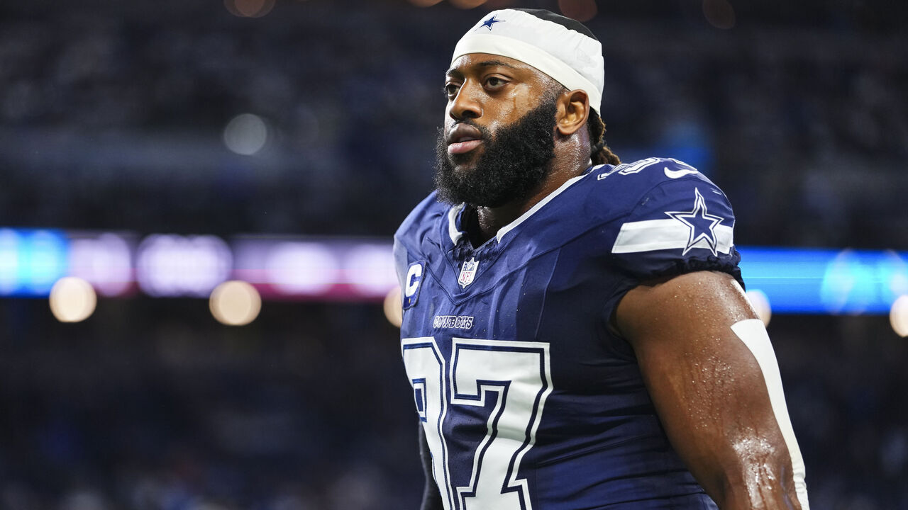 DETROIT, MI - DECEMBER 04: Osa Odighizuwa #97 of the Dallas Cowboys runs out of the tunnel prior to an NFL football game against the Detroit Lions at Ford Field on December 4, 2025 in Detroit, Michigan.