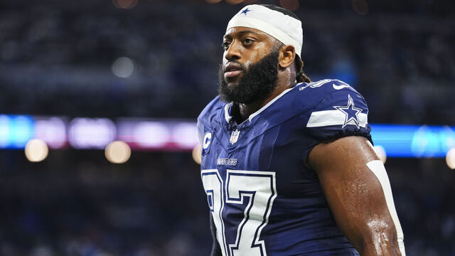 DETROIT, MI - DECEMBER 04: Osa Odighizuwa #97 of the Dallas Cowboys runs out of the tunnel prior to an NFL football game against the Detroit Lions at Ford Field on December 4, 2025 in Detroit, Michigan.