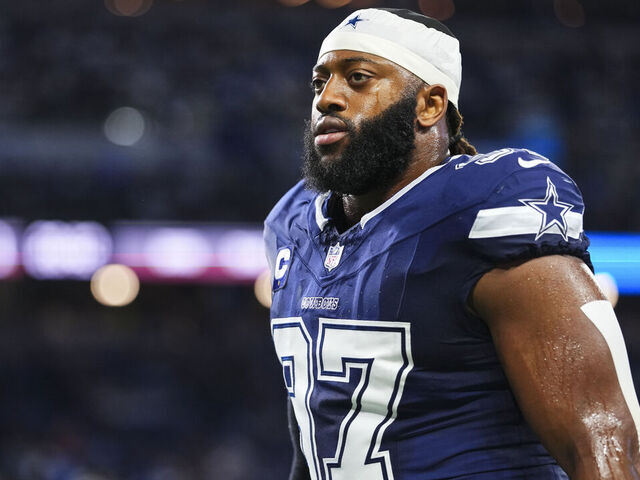 DETROIT, MI - DECEMBER 04: Osa Odighizuwa #97 of the Dallas Cowboys runs out of the tunnel prior to an NFL football game against the Detroit Lions at Ford Field on December 4, 2025 in Detroit, Michigan.