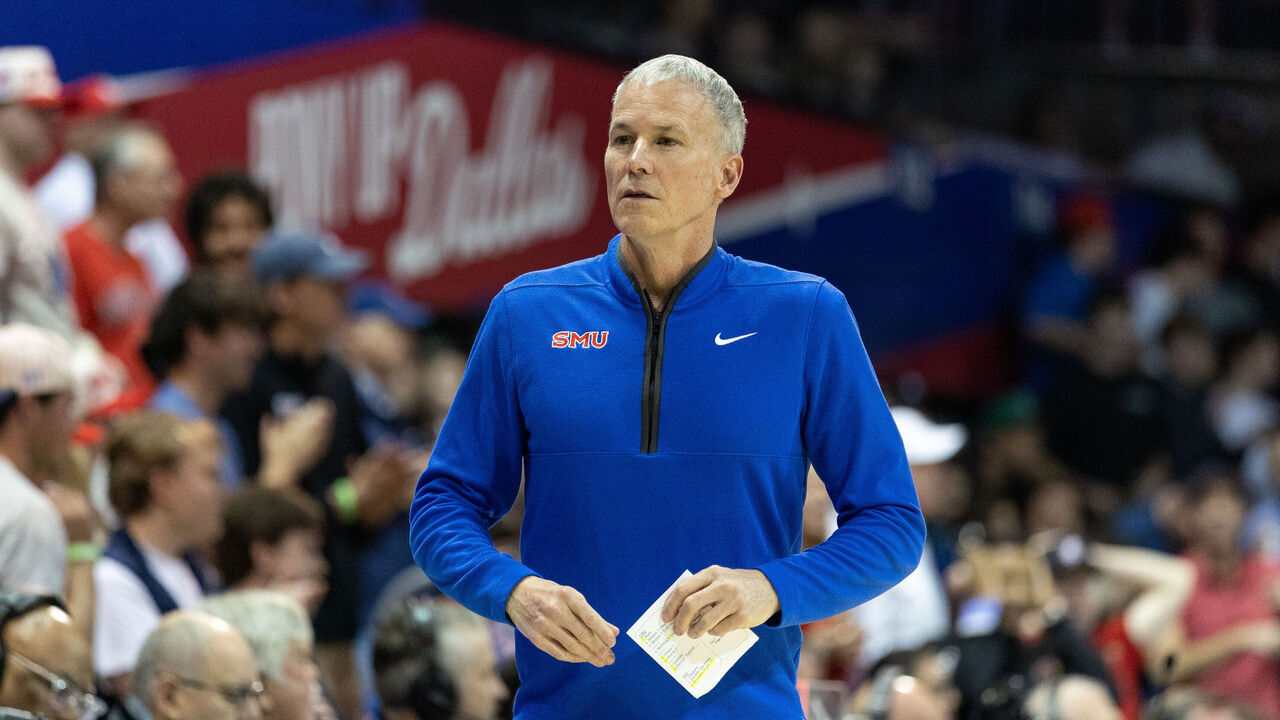 DALLAS, TEXAS - FEBRUARY 17: Andy Enfield of the Southern Methodist University Mustangs looks to the bench in the first half during NCAA basketball game between University of Louisville and Southern Methodist University at Moody Coliseum on February 17, 2026 in Dallas, Texas.