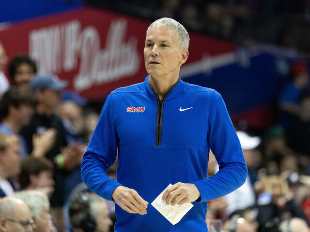DALLAS, TEXAS - FEBRUARY 17: Andy Enfield of the Southern Methodist University Mustangs looks to the bench in the first half during NCAA basketball game between University of Louisville and Southern Methodist University at Moody Coliseum on February 17, 2026 in Dallas, Texas.