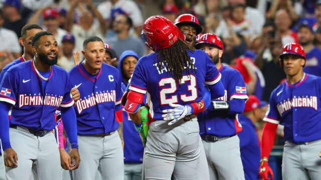 MIAMI, FL - MARCH 11: Fernando Tatis Jr. #23 of Team Dominican Republic celebrates with teammates at home plate after hitting a three-run home run in the fourth inning during the 2026 World Baseball Classic Pool D game presented by Capital One between Team Dominican Republic and Team Venezuela at loanDepot park on Wednesday, March 11, 2026 in Miami, Florida.