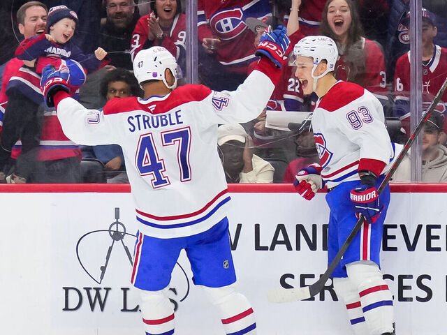 OTTAWA, CANADA - MARCH 11: Ivan Demidov #93 of the Montréal Canadiens celebrates his goal with teammate Jayden Struble #47 in the third period against the Ottawa Senators at Canadian Tire Centre on March 11, 2026 in Ottawa, Ontario, Canada.
