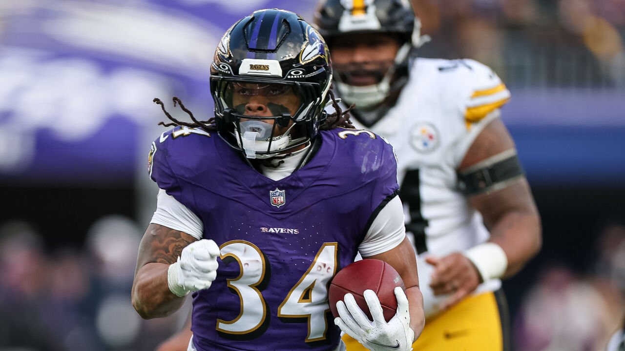 BALTIMORE, MD - DECEMBER 07: Keaton Mitchell #34 of the Baltimore Ravens carries the ball against the Pittsburgh Steelers during the second half at M&T Bank Stadium on December 7, 2025 in Baltimore, Maryland.
