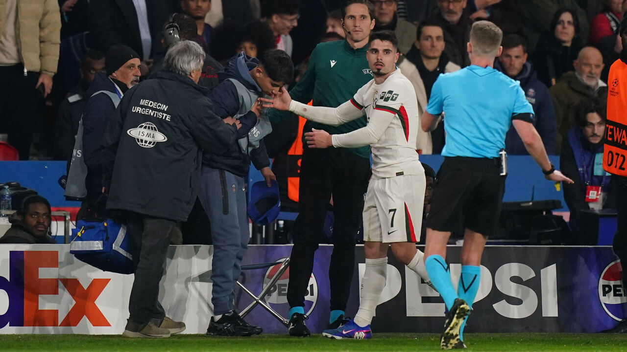 Chelsea's Pedro Neto apologies to the Paris Saint-Germain's ball boy during the UEFA Champions League round of sixteen, first leg match at the Parc des Princes, Paris. Picture date: Wednesday March 11, 2026.
