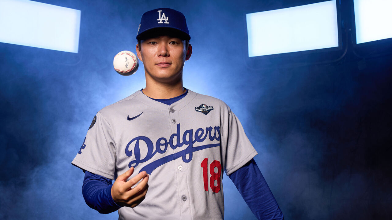TORONTO, ON - OCTOBER 23: Yoshinobu Yamamoto #18 of the Los Angeles Dodgers poses for a photo during the 2025 World Series photoshoot at the Rogers Centre on Thursday, October 23, 2025 in Toronto, Ontario, Canada.