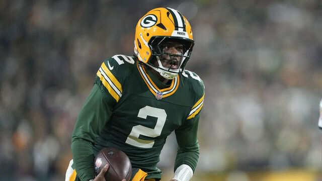GREEN BAY, WISCONSIN - DECEMBER 27: Malik Willis #2 of the Green Bay Packers runs with the ball for a touchdown in the second quarter against the Baltimore Ravens at Lambeau Field on December 27, 2025 in Green Bay, Wisconsin.
