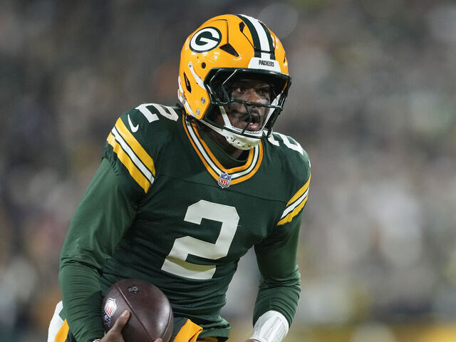 GREEN BAY, WISCONSIN - DECEMBER 27: Malik Willis #2 of the Green Bay Packers runs with the ball for a touchdown in the second quarter against the Baltimore Ravens at Lambeau Field on December 27, 2025 in Green Bay, Wisconsin.