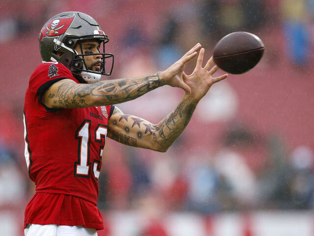 TAMPA, FLORIDA - JANUARY 03: Mike Evans #13 of the Tampa Bay Buccaneers warms up prior to the game against the Carolina Panthers during a game at Raymond James Stadium on January 03, 2026 in Tampa, Florida.