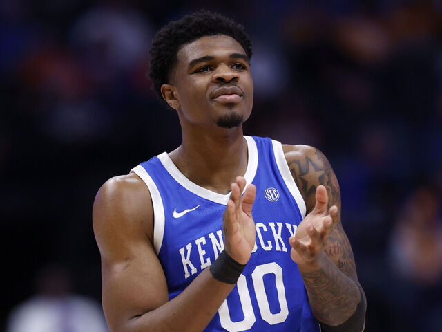 NASHVILLE, TENNESSEE - MARCH 12: Otega Oweh #00 of the Kentucky Wildcats reacts to a play during the first half in the second round of the 2026 SEC Men's Basketball Tournament against the Missouri Tigers at Bridgestone Arena on March 12, 2026 in Nashville, Tennessee.
