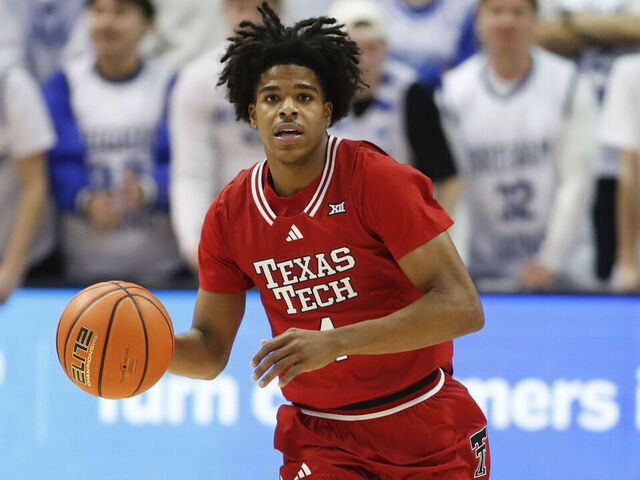 PROVO, UT - MARCH 7: Christian Anderson #4 of the Texas Tech Red Raiders rushes the ball up the court during the first half of their game against the Brigham Young Cougars at the Marriott Center on March 7, 2026 in Provo, Utah.