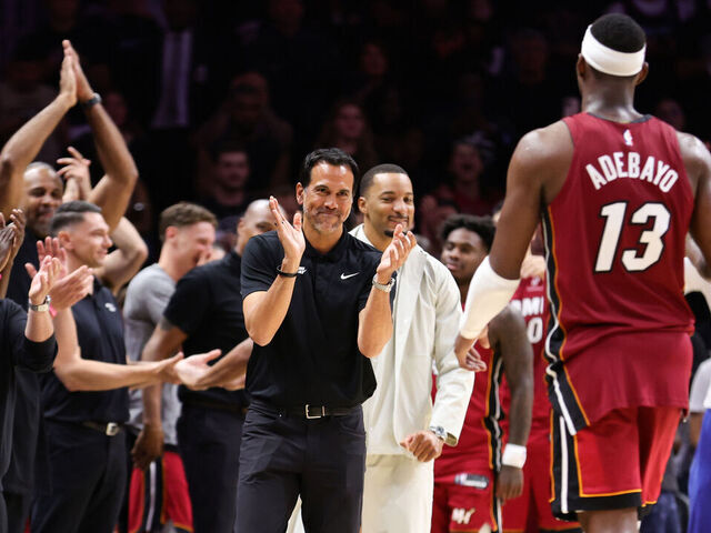 MIAMI, FLORIDA - MARCH 10: Head coach Erik Spoelstra of the Miami Heat celebrates as Bam Adebayo #13 leaves the game during the fourth quarter against the Washington Wizards at Kaseya Center on March 10, 2026 in Miami, Florida. Adebayo passed Kobe Bryant for the second most points scored in an NBA game with 83 in the 150-129 win.