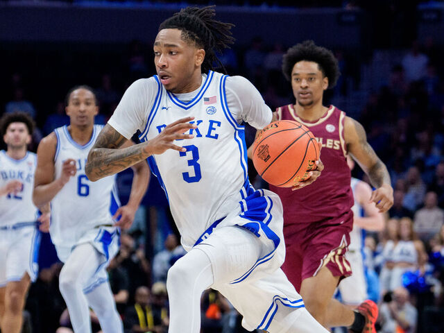CHARLOTTE, NORTH CAROLINA - MARCH 12: Isaiah Evans #3 of the Duke Blue Devils brings the ball up court in the first half against the Florida State Seminoles during the quarterfinals of the men's ACC Tournament at Spectrum Center on March 12, 2026 in Charlotte, North Carolina.