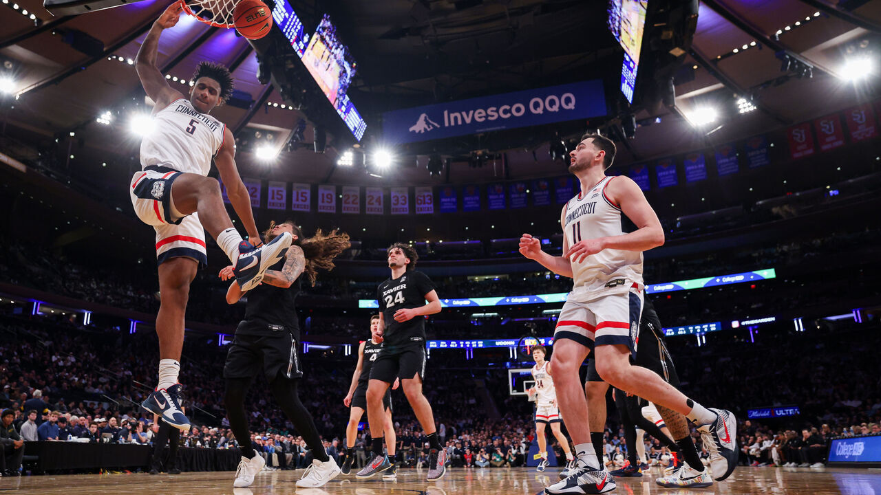 NEW YORK, NEW YORK - MARCH 12: Tarris Reed Jr. #5 of the UConn Huskies dunks the ball during the second half of the 2026 Big East Men's Tournament - Quarterfinal game against the Xavier Musketeers at Madison Square Garden on March 12, 2026 in New York City.