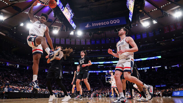 NEW YORK, NEW YORK - MARCH 12: Tarris Reed Jr. #5 of the UConn Huskies dunks the ball during the second half of the 2026 Big East Men's Tournament - Quarterfinal game against the Xavier Musketeers at Madison Square Garden on March 12, 2026 in New York City.