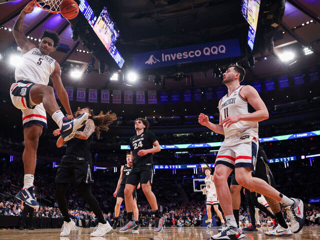 NEW YORK, NEW YORK - MARCH 12: Tarris Reed Jr. #5 of the UConn Huskies dunks the ball during the second half of the 2026 Big East Men's Tournament - Quarterfinal game against the Xavier Musketeers at Madison Square Garden on March 12, 2026 in New York City.