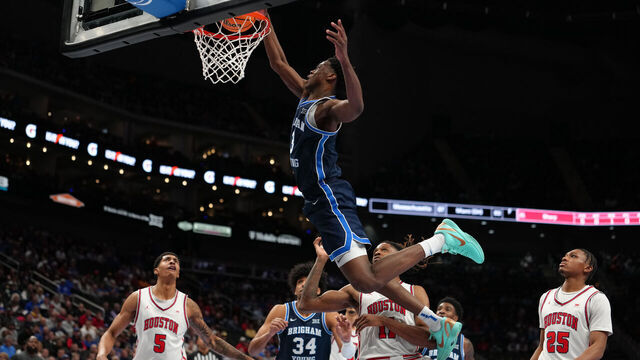 KANSAS CITY, MISSOURI - MARCH 12: AJ Dybantsa #3 of the BYU Cougars goes up for a dunks against the Houston Cougars in the first half during the quarterfinals of the Big 12 Tournament at T-Mobile Center on March 12, 2026 in Kansas City, Missouri.