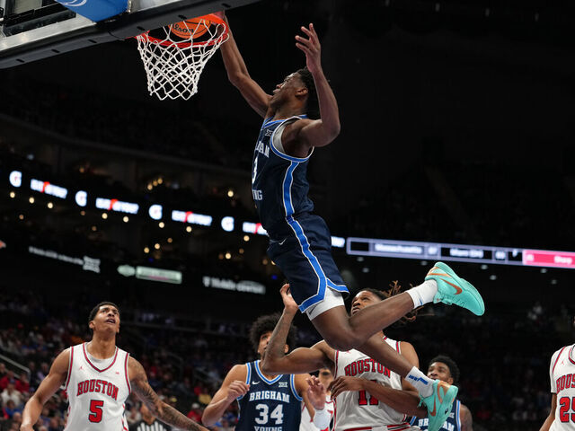 KANSAS CITY, MISSOURI - MARCH 12: AJ Dybantsa #3 of the BYU Cougars goes up for a dunks against the Houston Cougars in the first half during the quarterfinals of the Big 12 Tournament at T-Mobile Center on March 12, 2026 in Kansas City, Missouri.