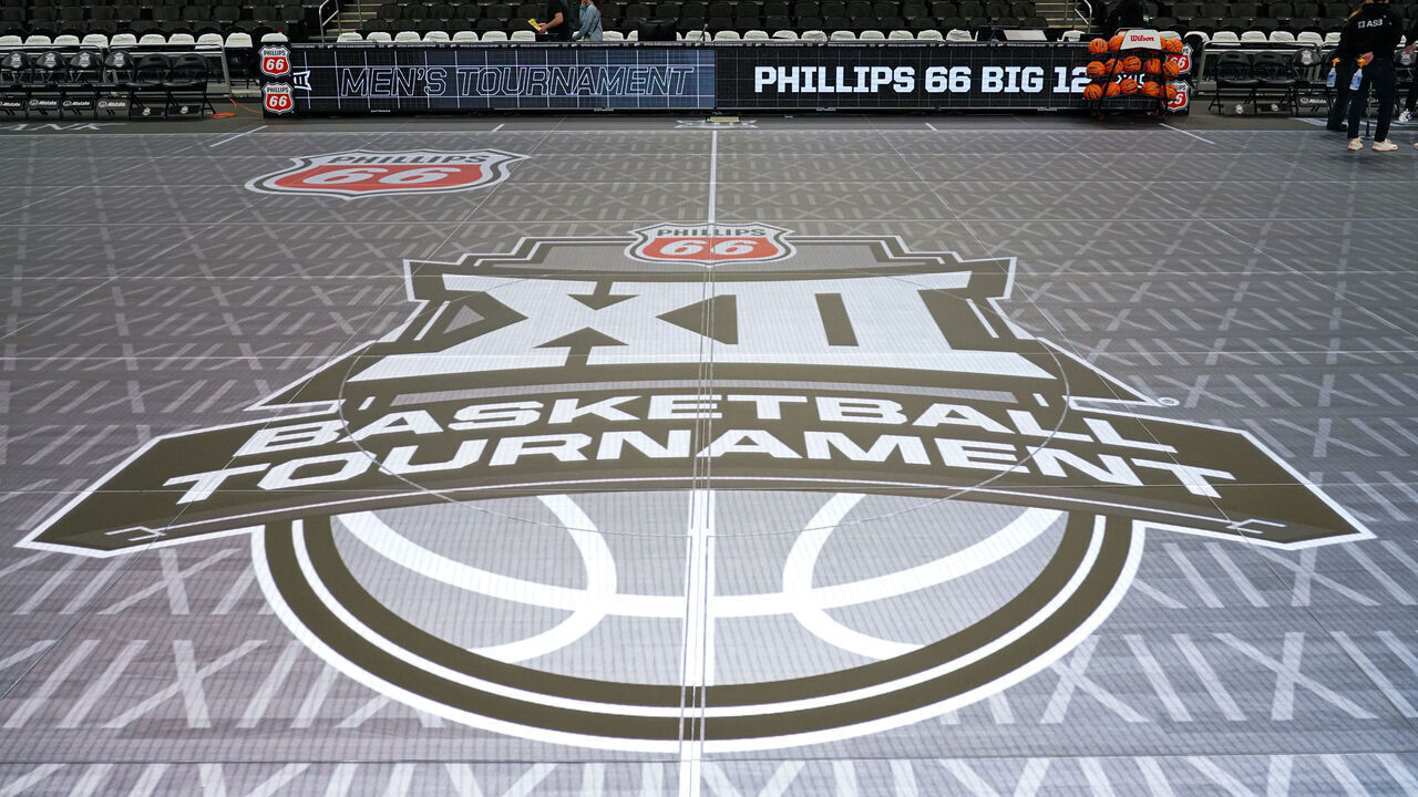 KANSAS CITY, MISSOURI - MARCH 9: A general view of the 2026 Phillips 66 Big 12 Tournament at center court of the ASB GlassFloor LED court at the 2026 Phillips 66 Big 12 Tournament in the T-Mobile Center on March 9, 2026 at the T-Mobile Center in Kansas City, Missouri.