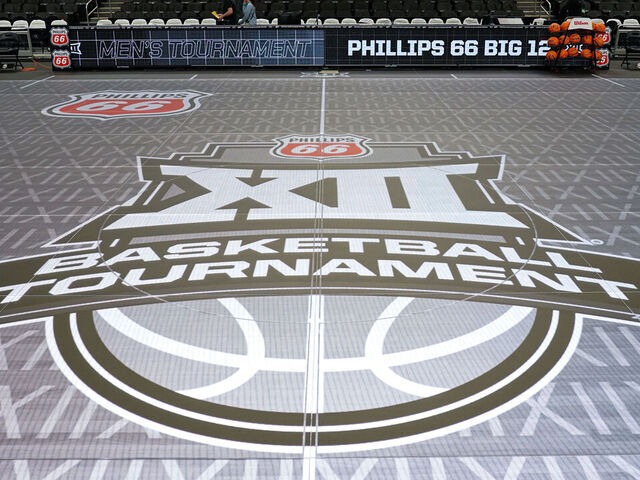 KANSAS CITY, MISSOURI - MARCH 9: A general view of the 2026 Phillips 66 Big 12 Tournament at center court of the ASB GlassFloor LED court at the 2026 Phillips 66 Big 12 Tournament in the T-Mobile Center on March 9, 2026 at the T-Mobile Center in Kansas City, Missouri.