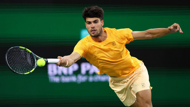 INDIAN WELLS, CALIFORNIA - MARCH 12: Carlos Alcaraz of Spain plays a forehand against Cameron Norrie of Great Britain in their quarterfinal match of the BNP Paribas Open at Indian Wells Tennis Garden on March 12, 2026 in Indian Wells, California.