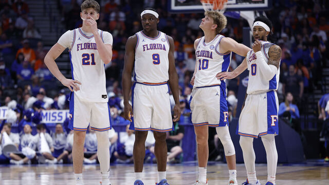 NASHVILLE, TN - MARCH 13: Florida Gators forward Alex Condon (21), center Rueben Chinyelu (9), forward Thomas Haugh (10), and guard Boogie Fland (0) during a quarterfinal round game of the SEC Tournament between the Florida Gators and Kentucky Wildcats, March 13, 2026 at Bridgestone Arena in Nashville, Tennessee.