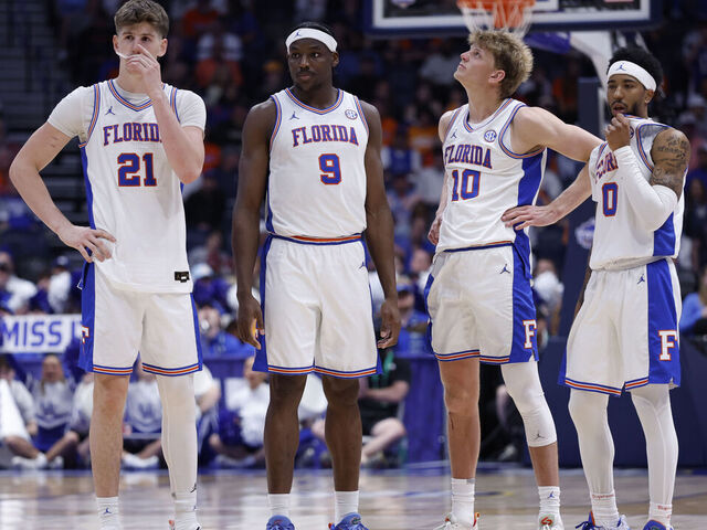 NASHVILLE, TN - MARCH 13: Florida Gators forward Alex Condon (21), center Rueben Chinyelu (9), forward Thomas Haugh (10), and guard Boogie Fland (0) during a quarterfinal round game of the SEC Tournament between the Florida Gators and Kentucky Wildcats, March 13, 2026 at Bridgestone Arena in Nashville, Tennessee.