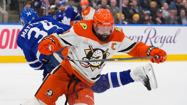 TORONTO, CANADA - MARCH 12: Radko Gudas #7 of the Anaheim Ducks takes a kneeing penalty against Auston Matthews #34 of the Toronto Maple Leafs in the second period at Scotiabank Arena on March 12, 2026 in Toronto, Ontario, Canada.