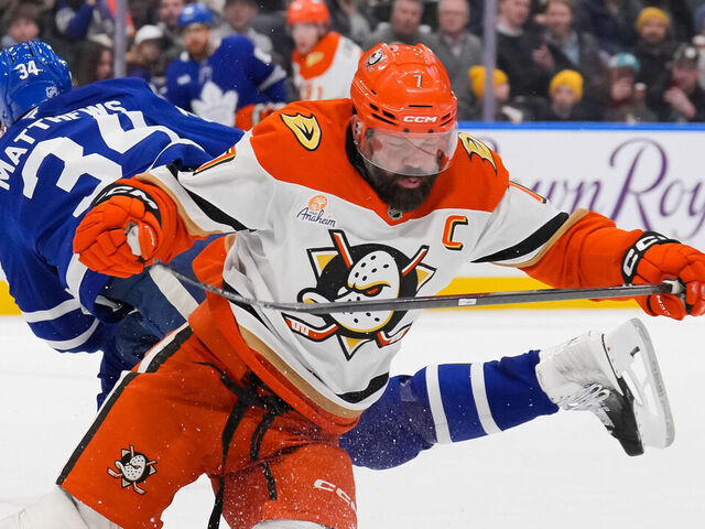 TORONTO, CANADA - MARCH 12: Radko Gudas #7 of the Anaheim Ducks takes a kneeing penalty against Auston Matthews #34 of the Toronto Maple Leafs in the second period at Scotiabank Arena on March 12, 2026 in Toronto, Ontario, Canada.
