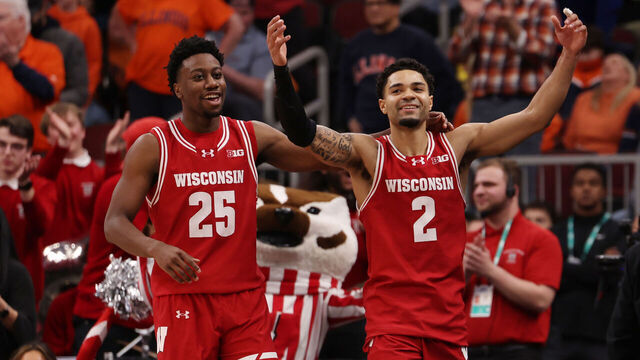 CHICAGO, ILLINOIS - MARCH 13: Nick Boyd #2 and John Blackwell #25 of the Wisconsin Badgers celebrate in the second half against the Illinois Fighting Illini during the quarterfinals of the 2026 Big Ten Men's Basketball Tournament at the United Center on March 13, 2026 in Chicago, Illinois.