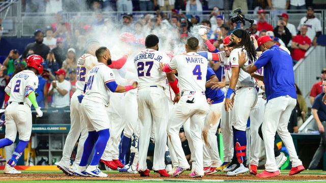 MIAMI, FL - MARCH 13: Austin Wells #28 of Team Dominican Republic celebrates with teammates after hitting a three-run home run in the seventh inning during the 2026 World Baseball Classic Quarterfinals game presented by Capital One between Team Korea and Team Dominican Republic at loanDepot park on Friday, March 13, 2026 in Miami, Florida.
