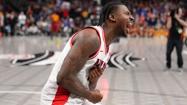 KANSAS CITY, MISSOURI - MARCH 13: Jaden Bradley #0 of the Arizona Wildcats celebrates after hitting the game-winning basket against the Iowa State Cyclones in the second half during the semifinals of the Big 12 Tournament at T-Mobile Center on March 13, 2026 in Kansas City, Missouri.