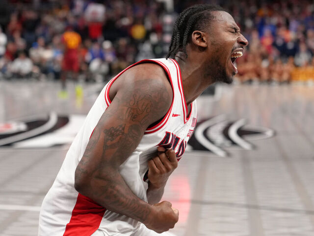KANSAS CITY, MISSOURI - MARCH 13: Jaden Bradley #0 of the Arizona Wildcats celebrates after hitting the game-winning basket against the Iowa State Cyclones in the second half during the semifinals of the Big 12 Tournament at T-Mobile Center on March 13, 2026 in Kansas City, Missouri.