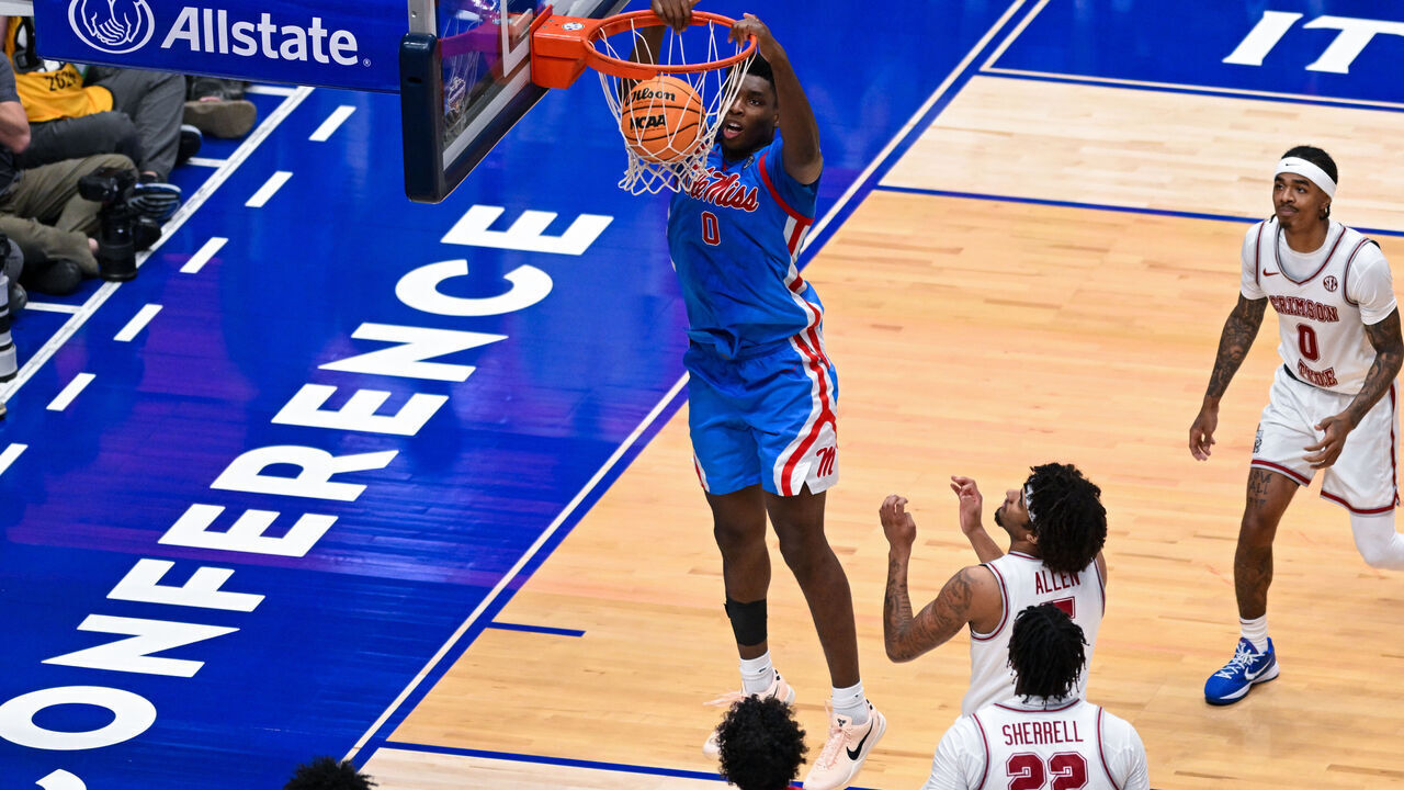 NASHVILLE, TENNESSEE - MARCH 13: Malik Dia #0 of the Ole Miss Rebels dunks the ball against the Alabama Crimson Tide in the second half at Bridgestone Arena on March 13, 2026 in Nashville, Tennessee.