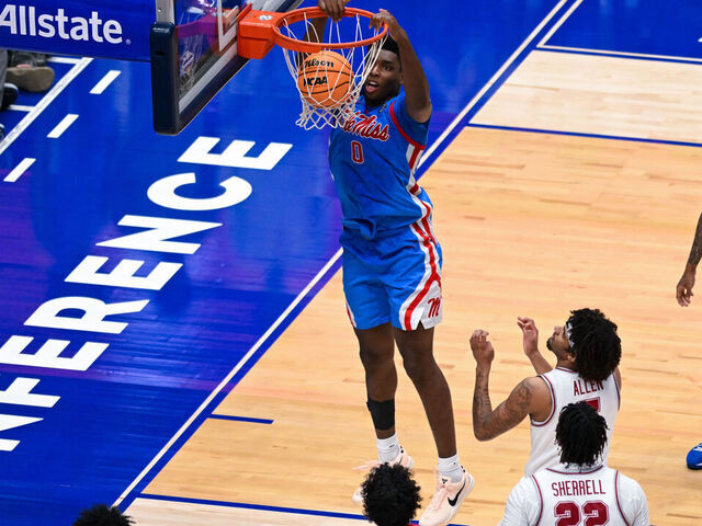 NASHVILLE, TENNESSEE - MARCH 13: Malik Dia #0 of the Ole Miss Rebels dunks the ball against the Alabama Crimson Tide in the second half at Bridgestone Arena on March 13, 2026 in Nashville, Tennessee.