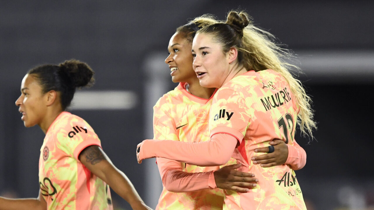 WASHINGTON, DC - MARCH 13: Olivia Moultrie #13 of Portland Thorns FC celebrates scoring her team's first goal during the NWSL match between Washington Spirit and Portland Thorns FC at Audi Field on March 13, 2026 in Washington, DC.