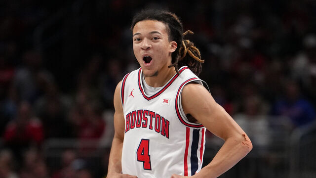 KANSAS CITY, MISSOURI - MARCH 13: Kingston Flemings #4 of the Houston Cougars celebrates against the Kansas Jayhawks in the second half during the semifinals of the Big 12 Tournament at T-Mobile Center on March 13, 2026 in Kansas City, Missouri.