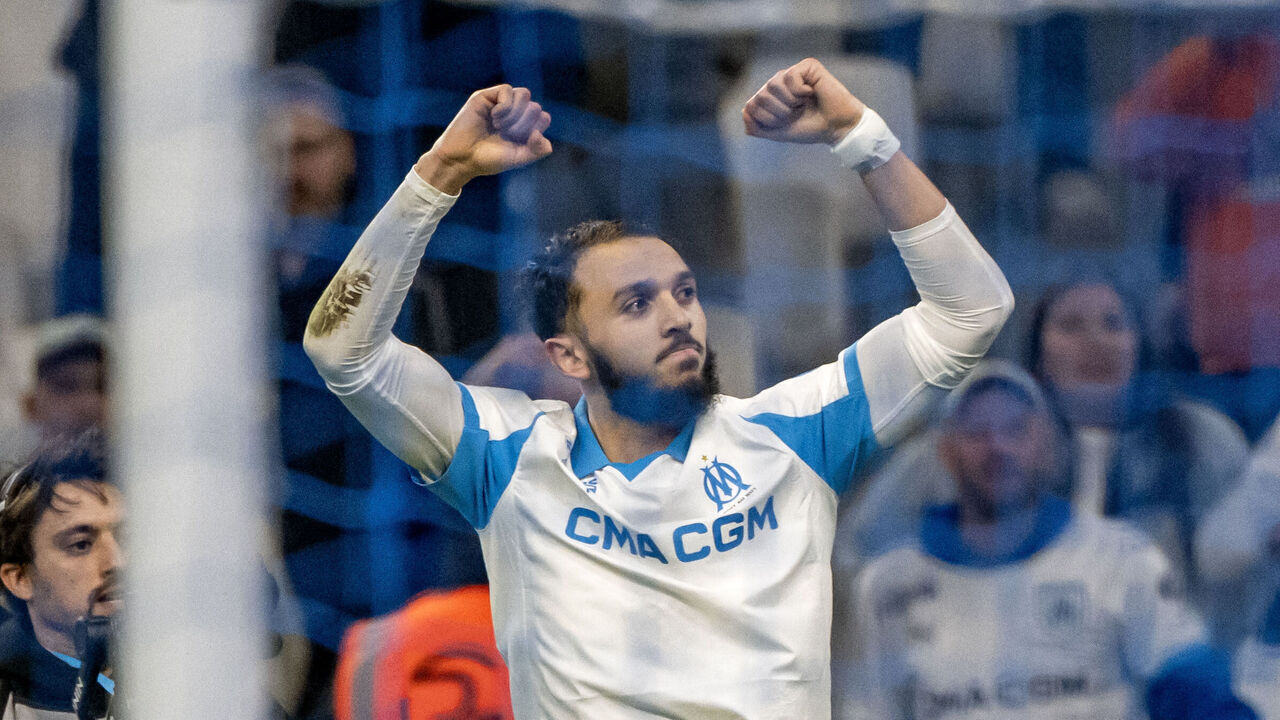 Marseille's Algerian forward #09 Amine Gouiri celebrates after scoring his team's first goal during the French L1 football match between Olympique de Marseille (OM) and Auxerre at the Stade Velodrome in Marseille, south-eastern France on March 13, 2026.