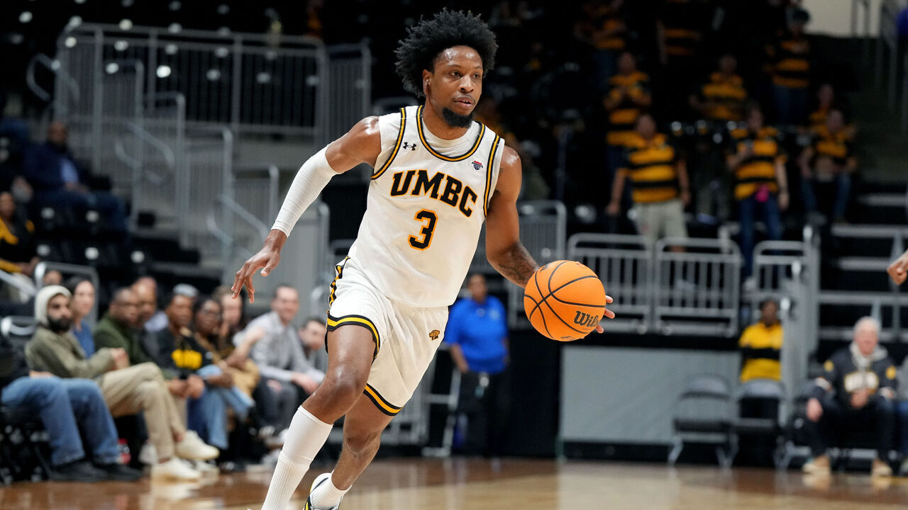 CATSONSVILLE, MD - FEBRUARY 26: DJ Armstrong #3 of the UMBC Retrievers dribbles up court during a college basketball game against the Bryant Bears at the Chesapeake Employers Insurance Arena on February 26, 2026 in Catonsville, Maryland.