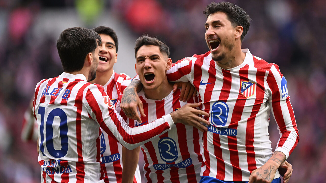 MADRID, SPAIN - MARCH 14: Nahuel Molina of Atletico de Madrid (C) celebrates scoring his team's first goal with teammates during the LaLiga EA Sports match between Atletico de Madrid and Getafe CF at Riyadh Air Metropolitano on March 14, 2026 in Madrid, Spain.