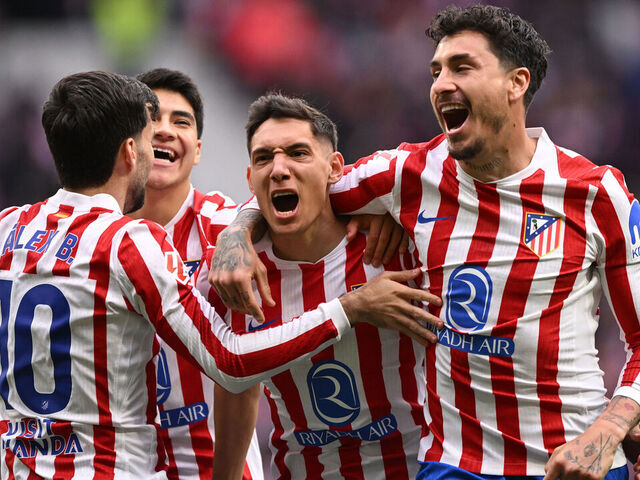 MADRID, SPAIN - MARCH 14: Nahuel Molina of Atletico de Madrid (C) celebrates scoring his team's first goal with teammates during the LaLiga EA Sports match between Atletico de Madrid and Getafe CF at Riyadh Air Metropolitano on March 14, 2026 in Madrid, Spain.